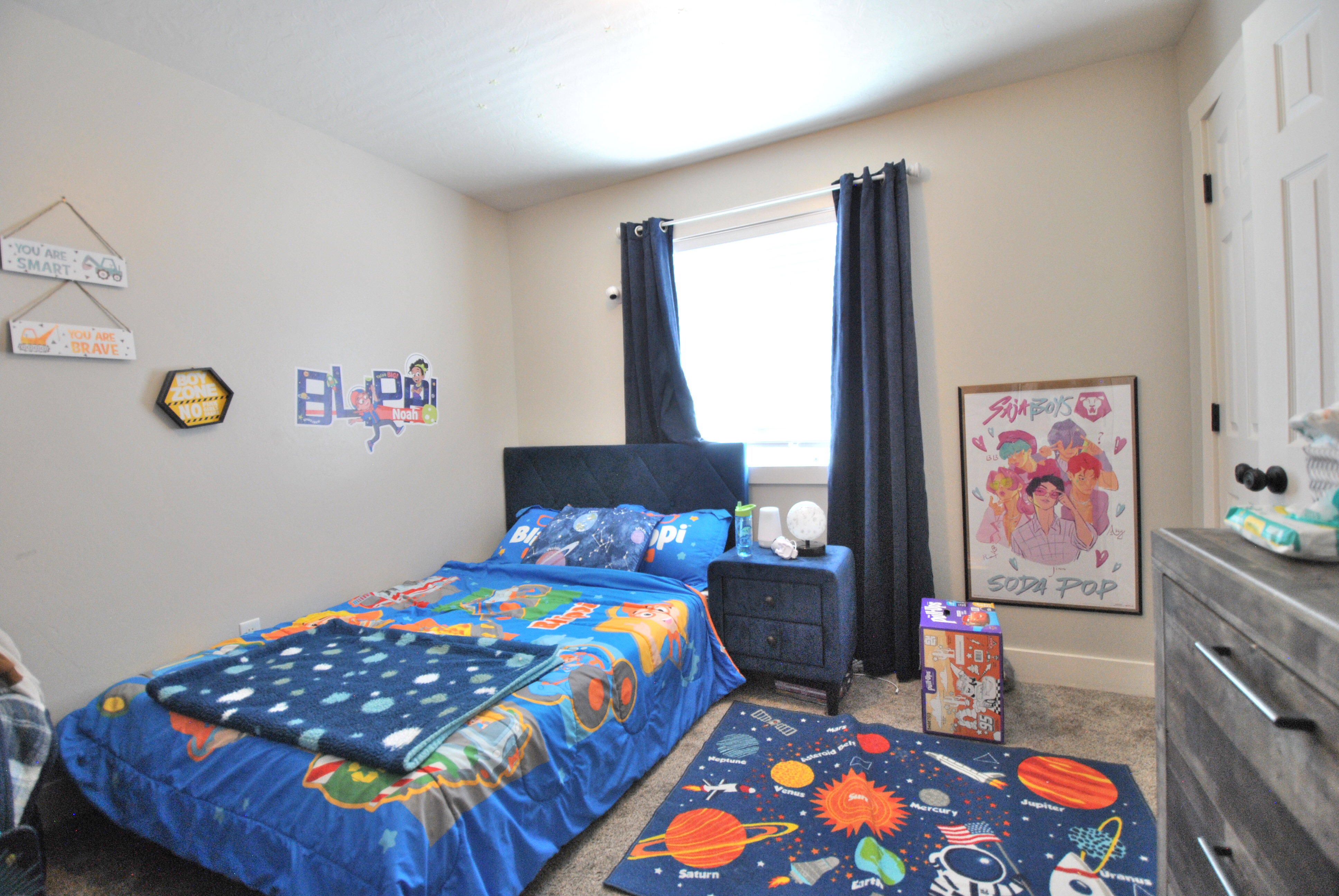 Bedroom featuring carpet