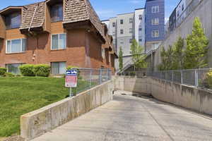 Entrance to covered parking is on 700 N. When showing this, park in these spaces.