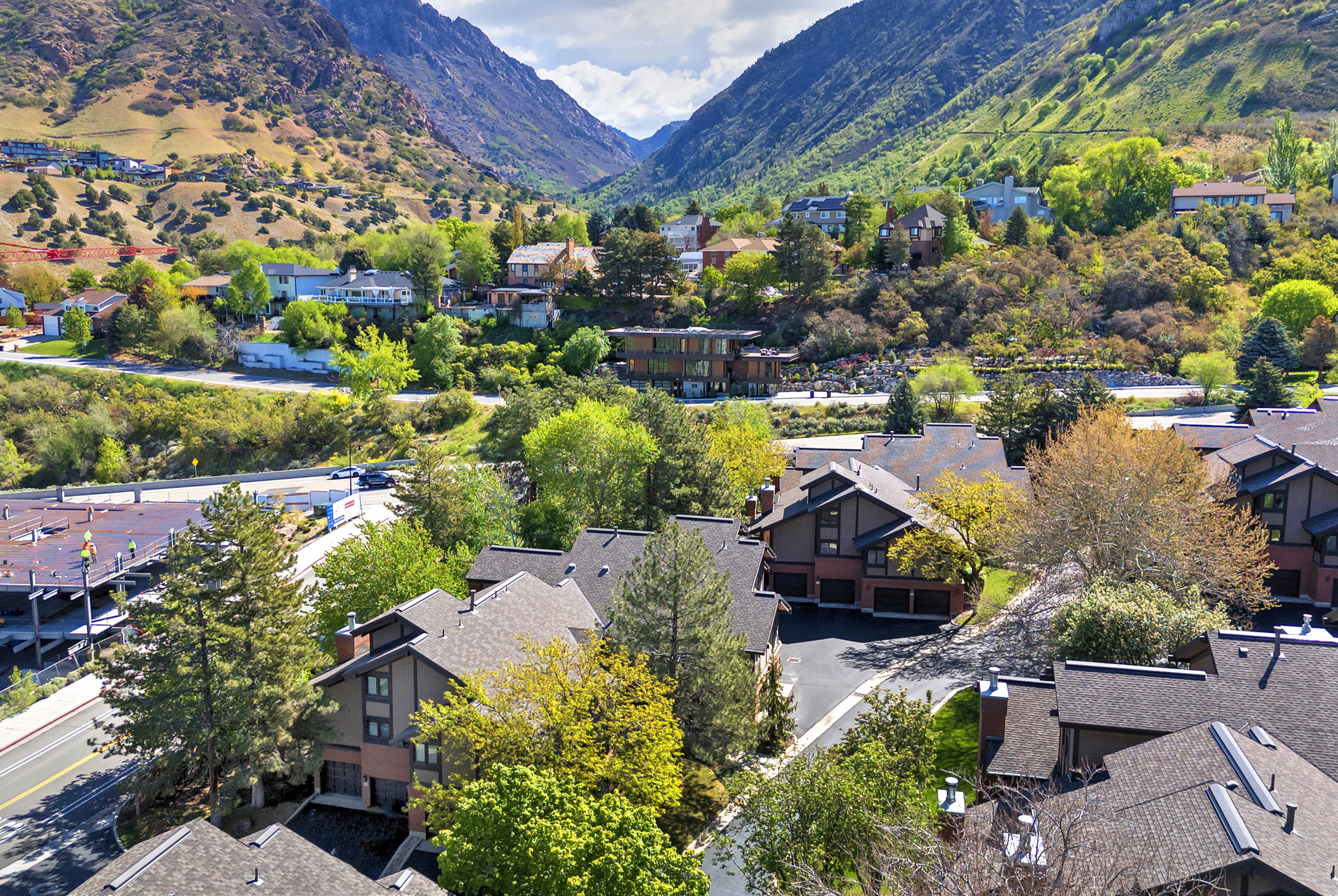 Aerial view of residential area with a mountainous background