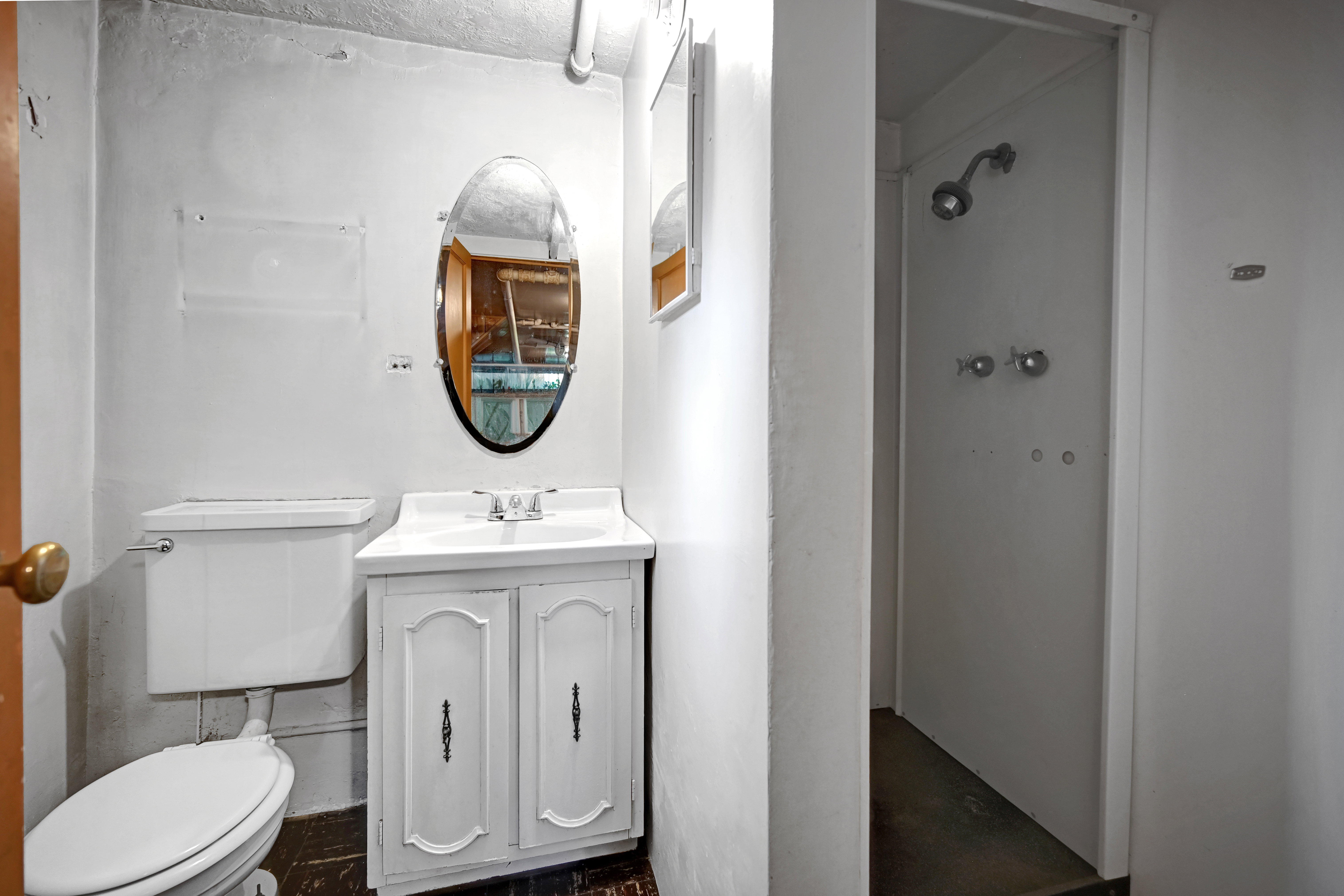 Bathroom with vanity and a stall shower
