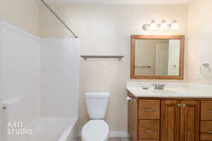 Full bath with vanity and bathtub / shower combination