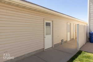 View of man door into garage