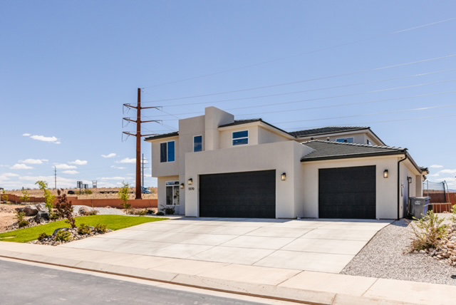 Contemporary stucco exterior with a multi-level design