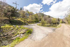View of asphalt road featuring a mountain view