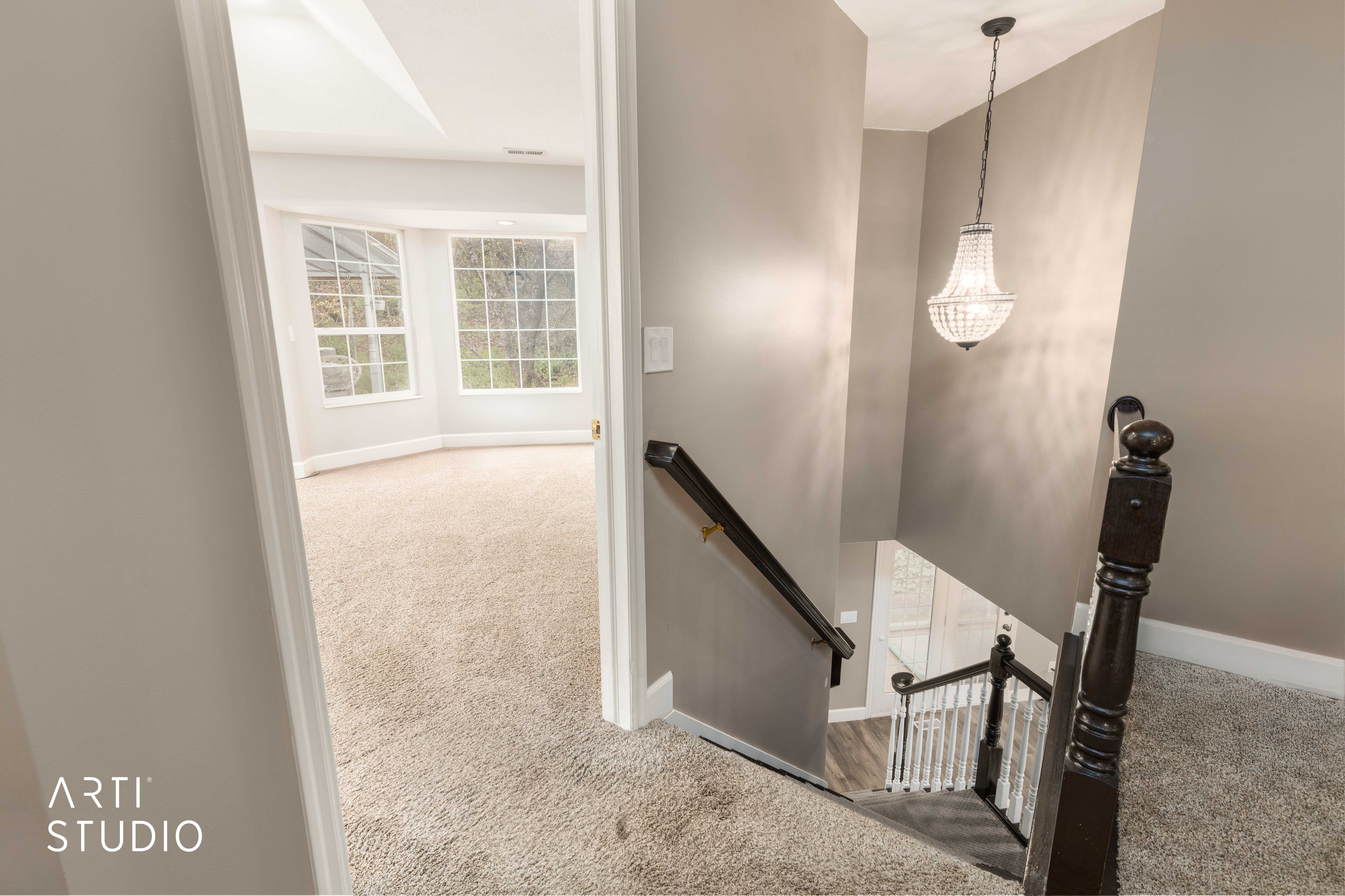 Stairway featuring carpet and baseboards