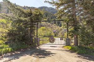 Gate featuring a view of trees