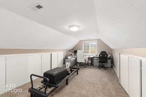 Office space featuring light carpet