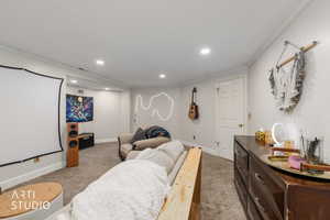 Living area featuring ornamental molding, recessed lighting, and carpet floors