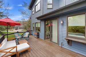 Wooden deck featuring outdoor furniture