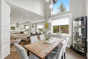 Dining area featuring a high ceiling