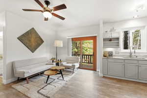 Mother in Law that can or can be a great office space or just additional living space. Kitchen featuring stainless steel appliances, ceiling fan, bedroom, bathroom and private entrance.