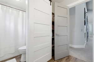 Bathroom with double vanity, healthy amount of natural light serving the 2 upstairs bedrooms