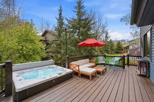 Wooden terrace with an outdoor living space