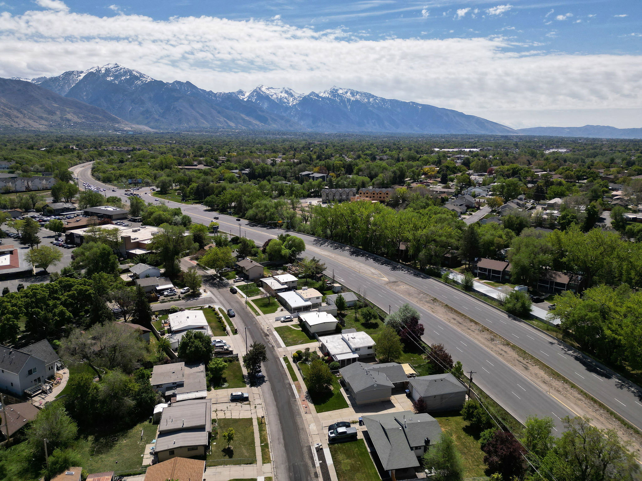 Aerial view of residential area featuring mountains