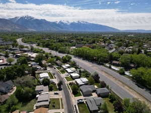 Aerial view of residential area featuring mountains