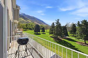 Balcony featuring a grill and a mountain view