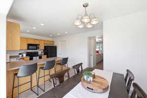 Dining space with suspended lighting