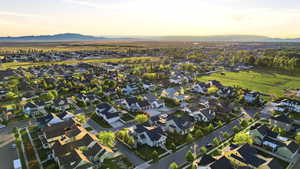 Aerial view of residential area featuring mountains