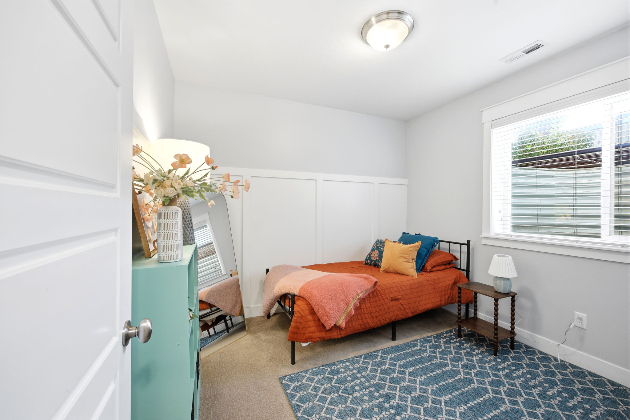 View of carpeted bedroom