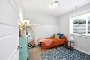 View of carpeted bedroom