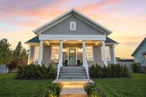 View of front of property featuring a porch