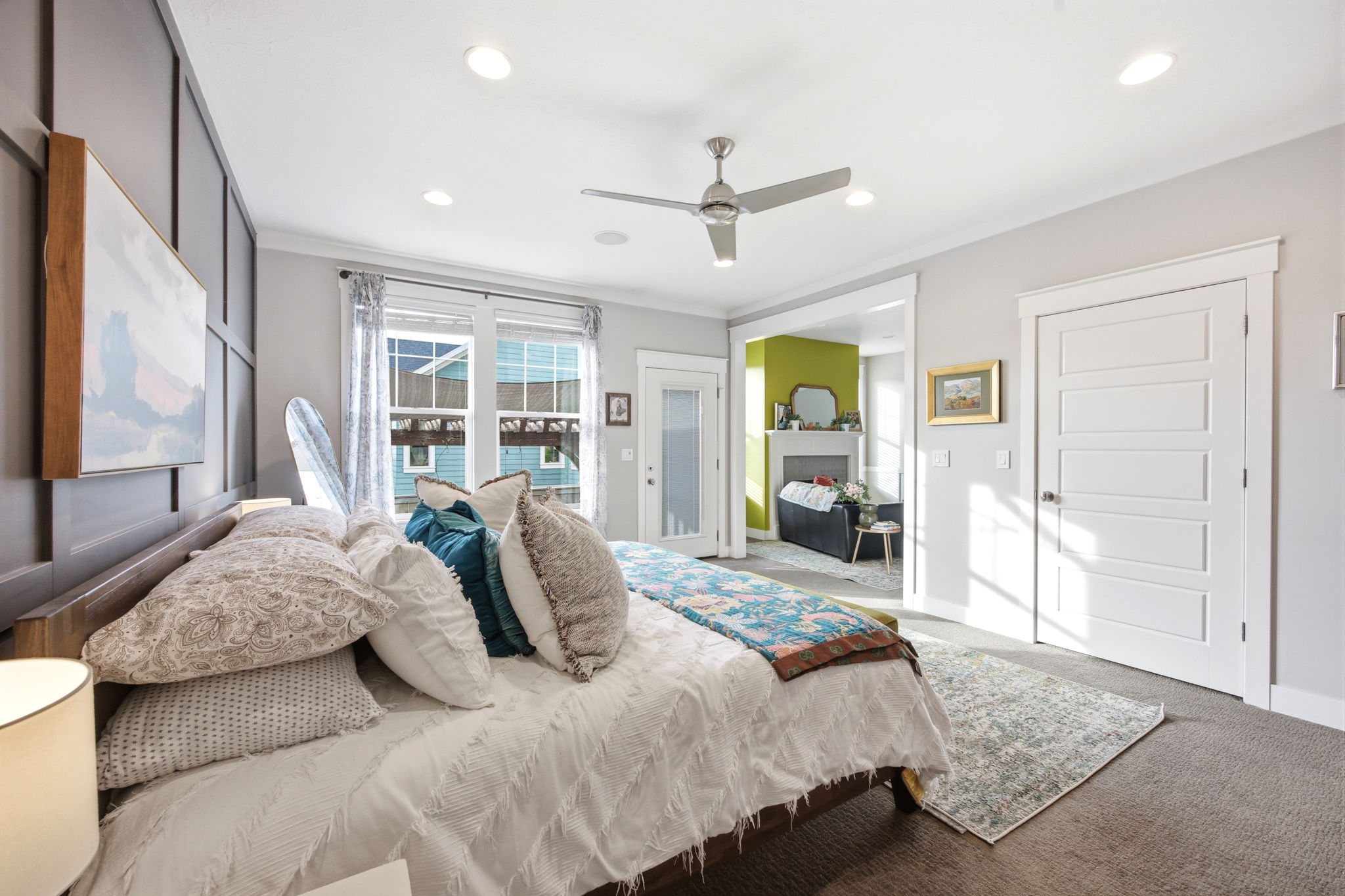Bedroom with carpet, ceiling fan, recessed lighting, and ornamental molding