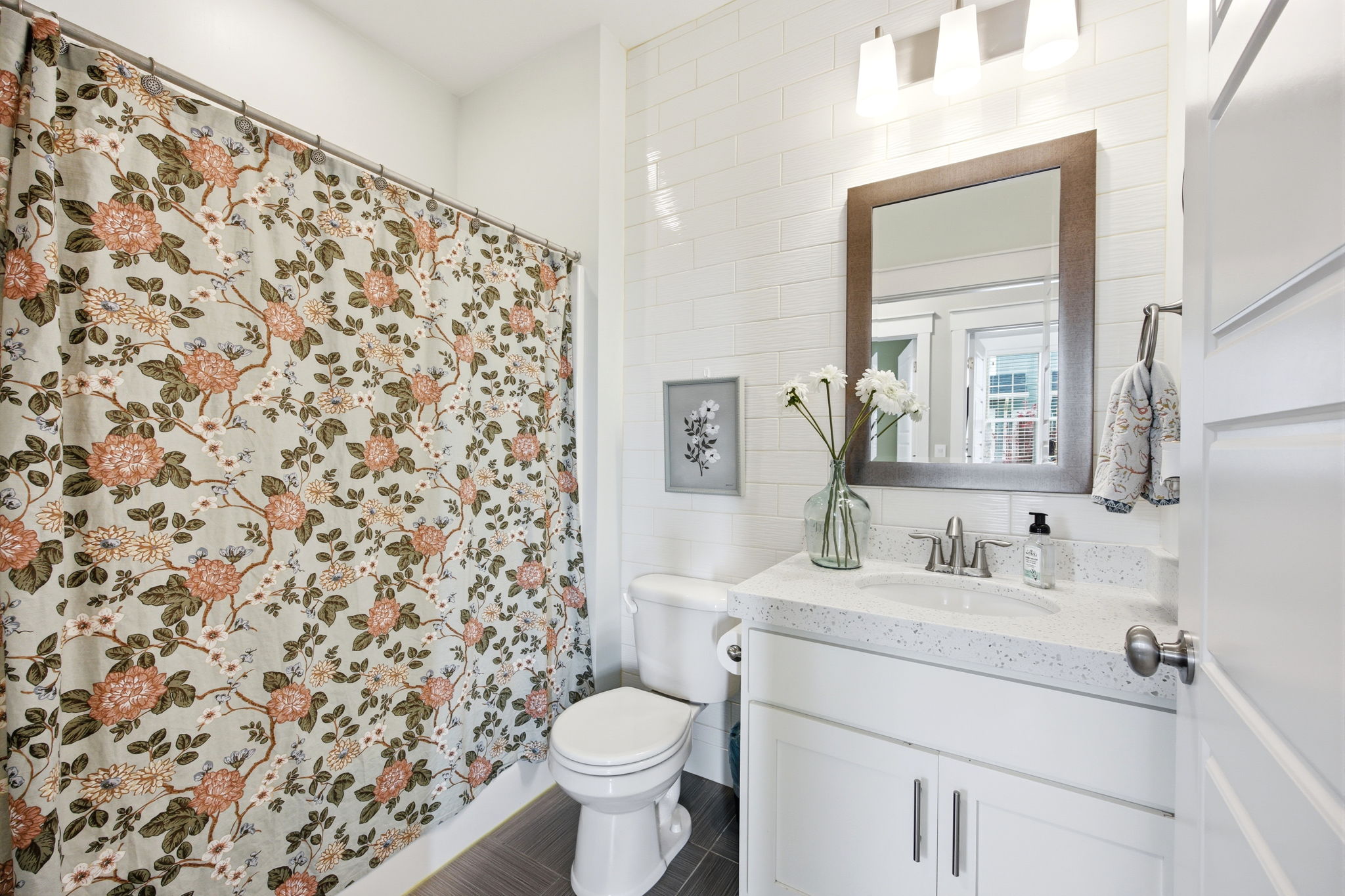 Full bath featuring vanity and a shower with curtain