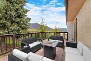 Private deck with a mountain view and view of 9th hold of Homestead Golf Course.