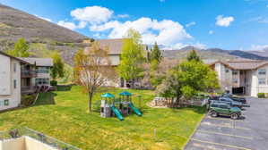 View of yard featuring a mountain view and a residential view