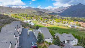 Aerial view of residential area featuring mountains