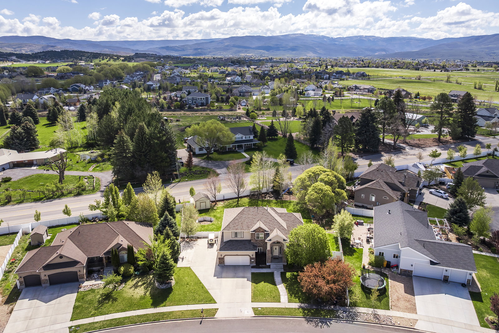 Aerial view of residential area with a mountain backdrop