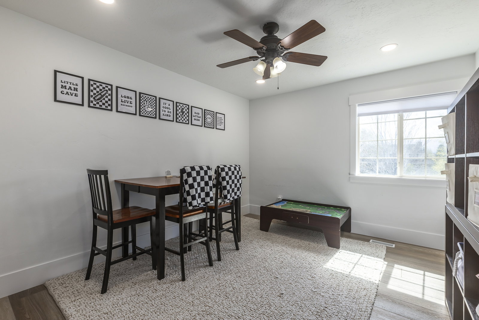Dining area with light wood-style floors, ceiling fan, and recessed lighting