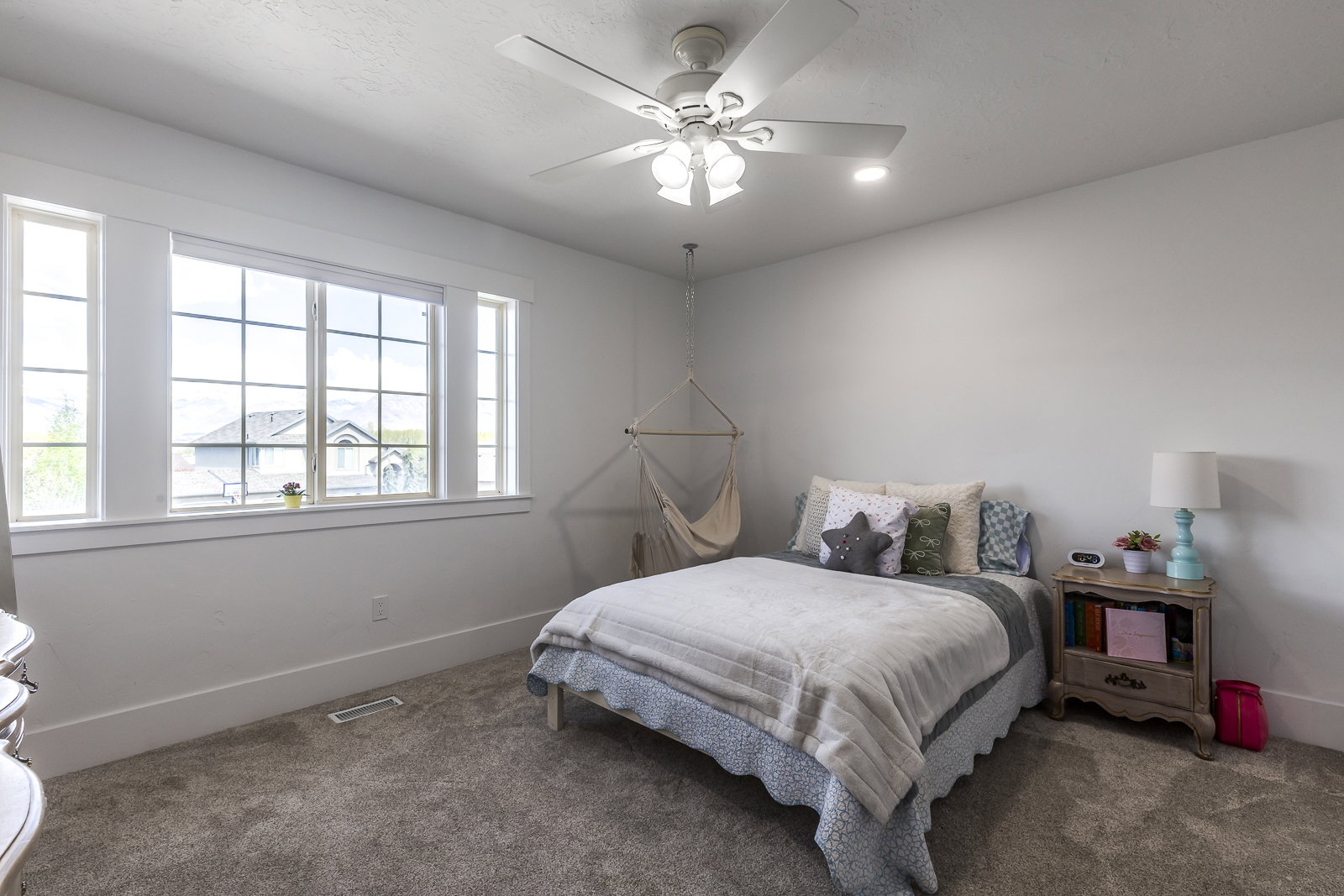Bedroom featuring carpet floors and a ceiling fan