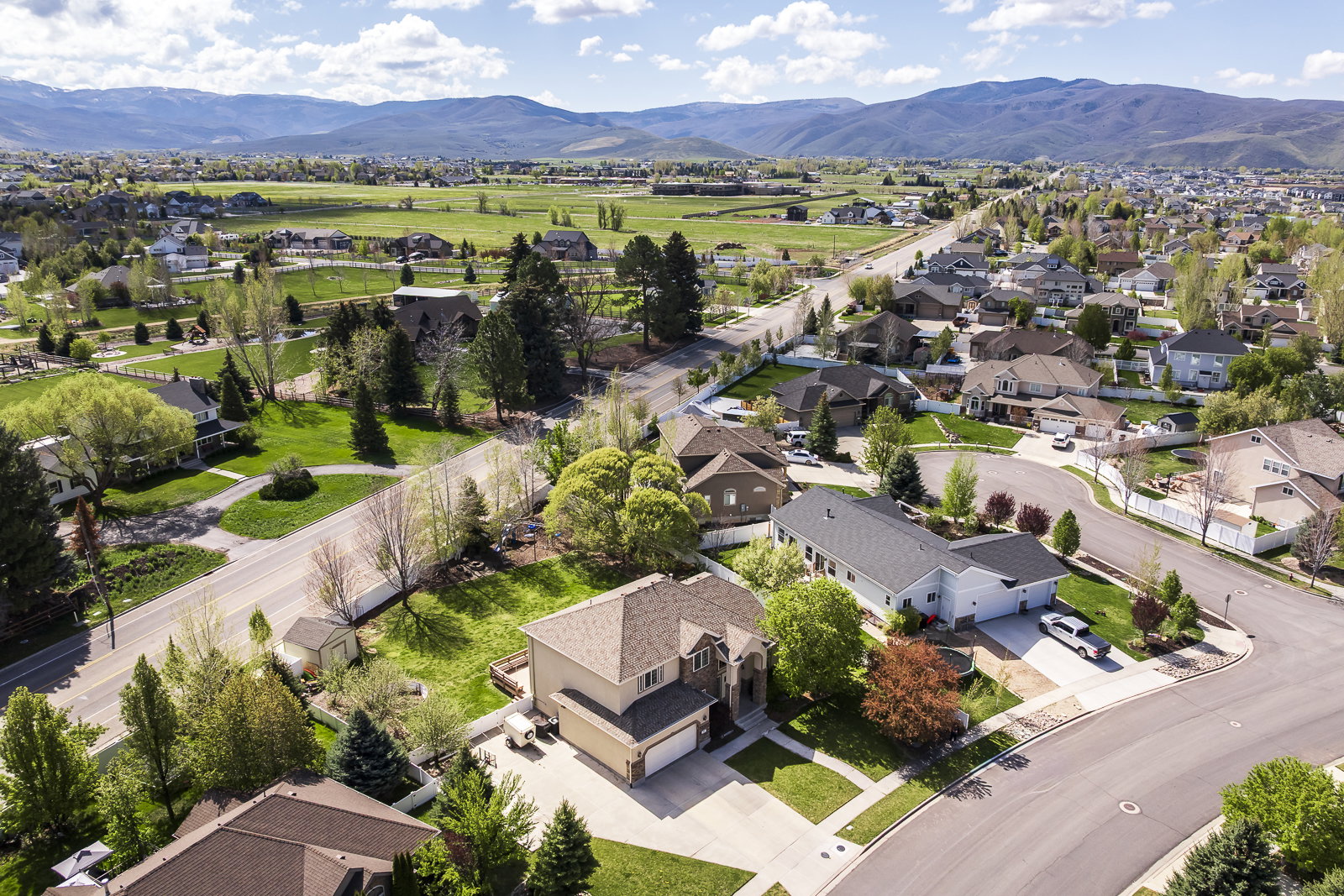 Aerial view of residential area with a mountain backdrop