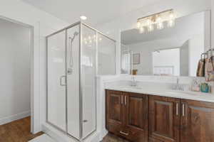 Ensuite bathroom with double vanity and a separate shower and tub