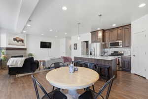Dining area looking toward kitchen and living space. Open enough for large gatherings, but just right for intimate evenings