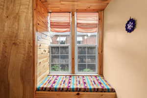 Main floor bedroom with window seat