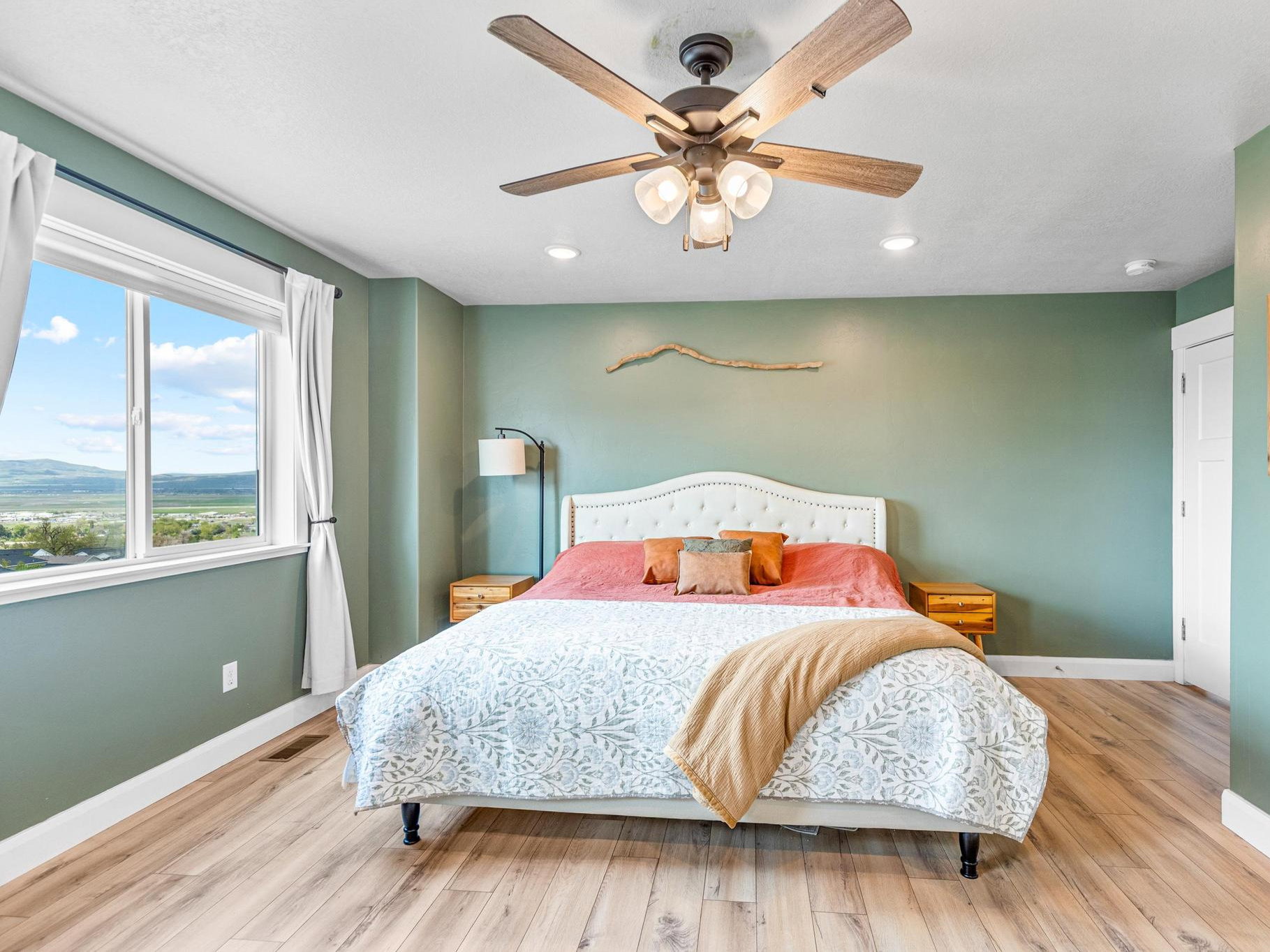 Bedroom with light wood-type flooring, a ceiling fan, and recessed lighting