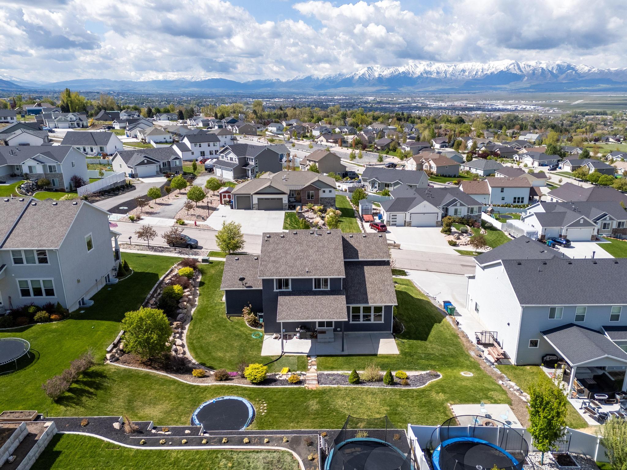 Aerial view of residential area with a mountain backdrop