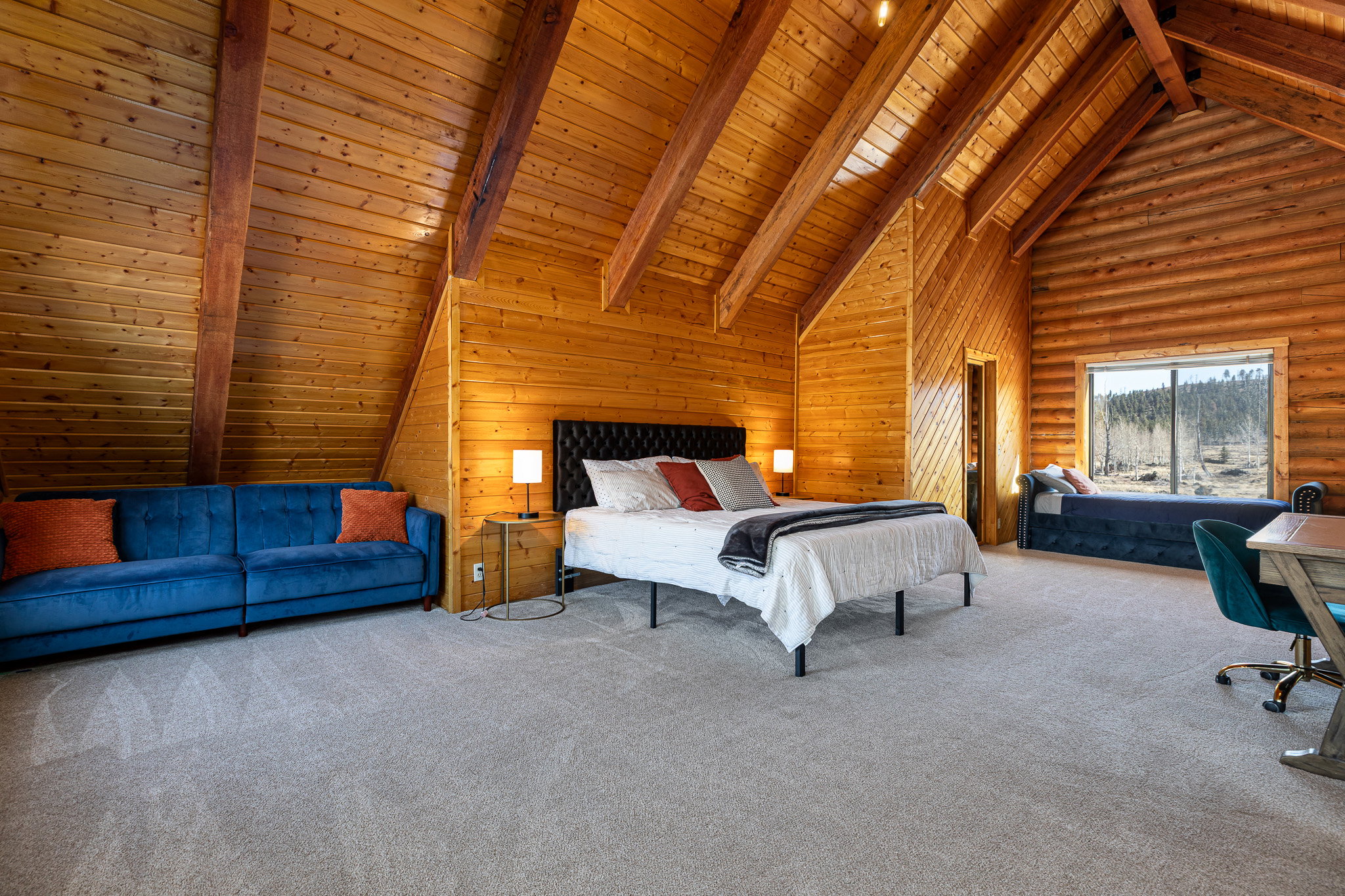 Carpeted bedroom featuring a high wood beamed ceiling, wood walls, and rustic walls