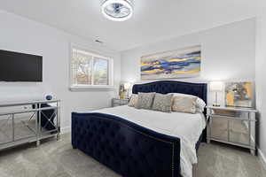 Bedroom featuring carpet