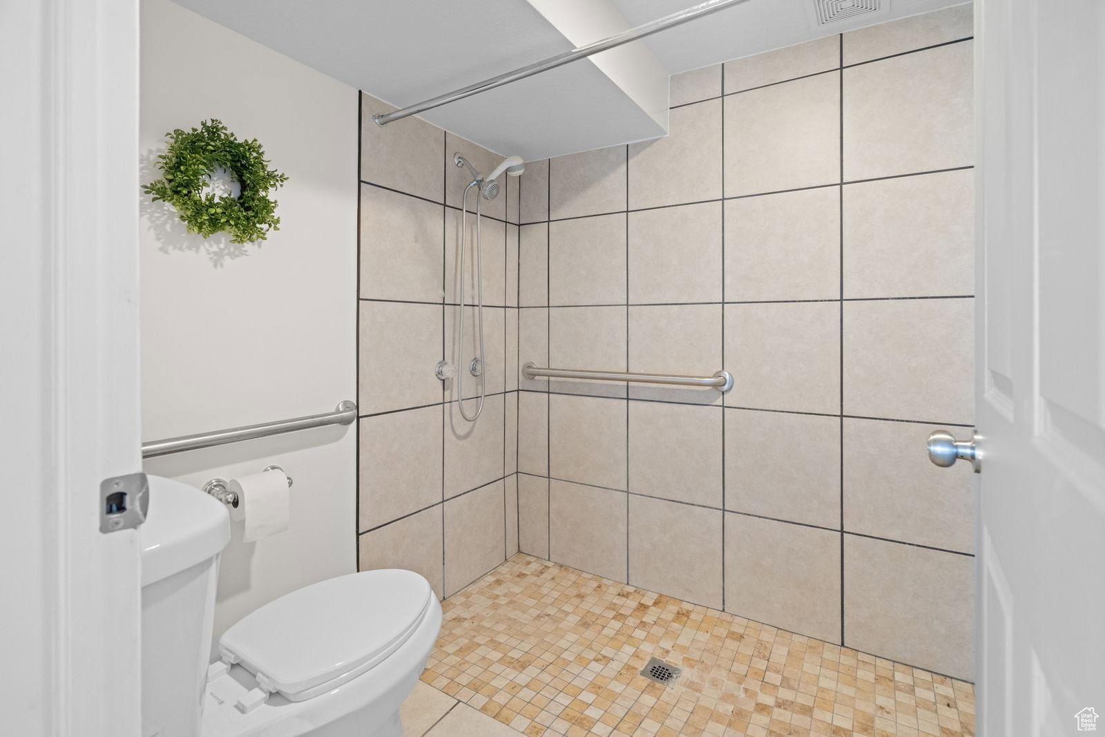Bathroom featuring a stall shower