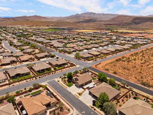 Aerial view of residential area with a mountainous background