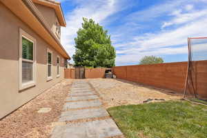 View of fenced backyard