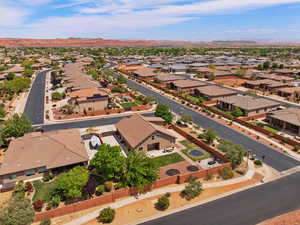 Aerial perspective of suburban area with a mountain backdrop