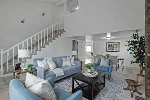 Living room featuring stairs