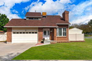 View of front of house. .**Pictures of yard are AI generated and reflect grass in yard. Seller is having a new sprinkler system installed and will reseed the yard at buyer's request**