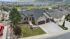 Aerial perspective of suburban area with a mountain backdrop