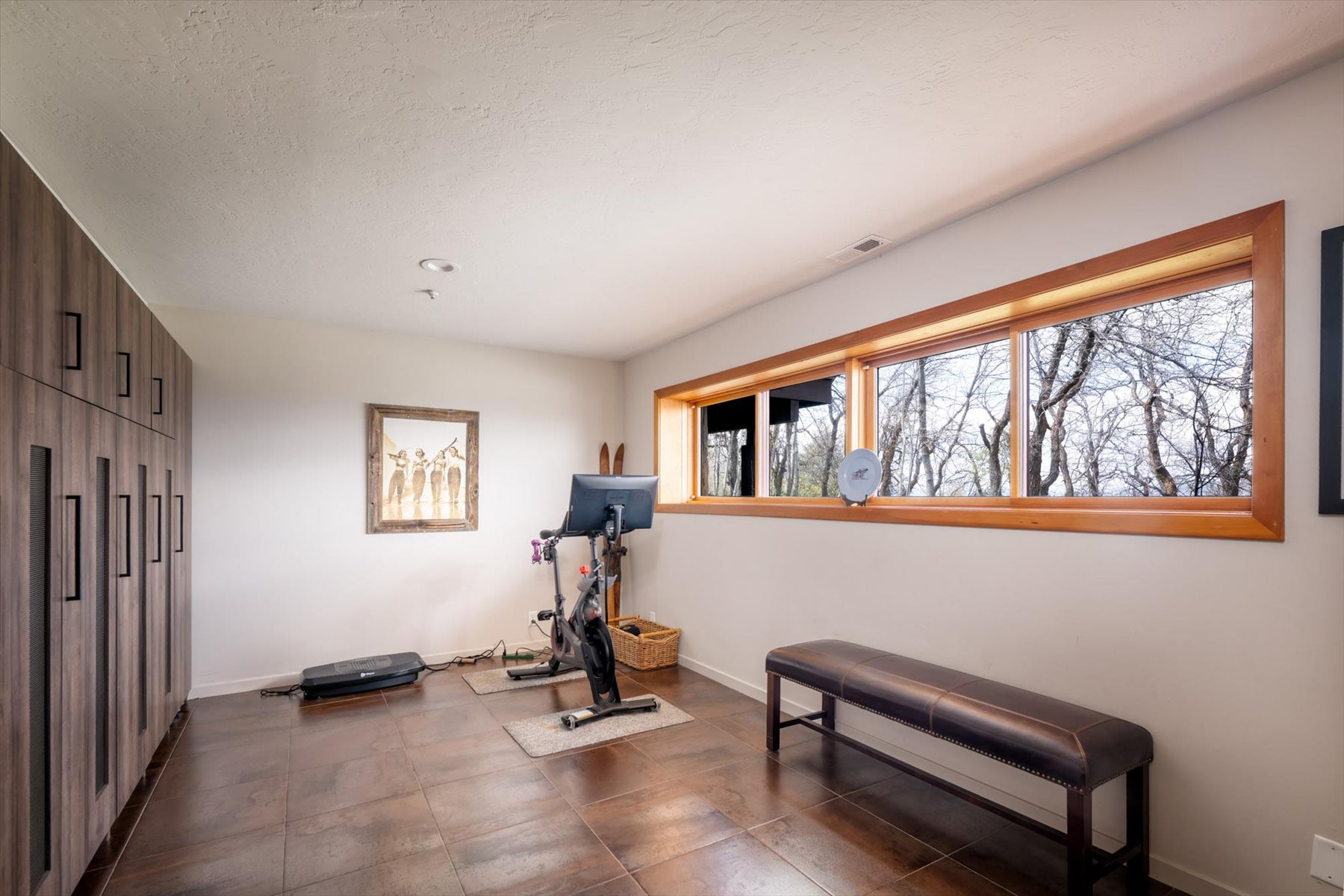 Workout area featuring baseboards
