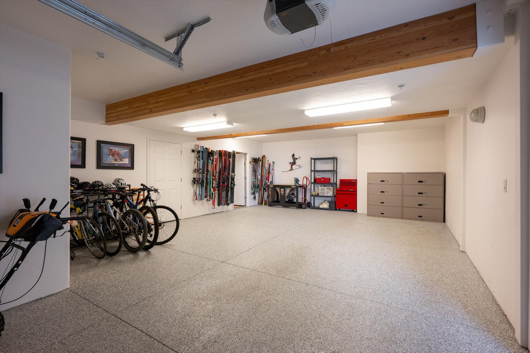 Garage featuring a garage door opener